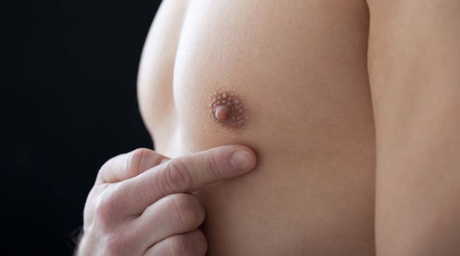 Closeup of man's nipple.